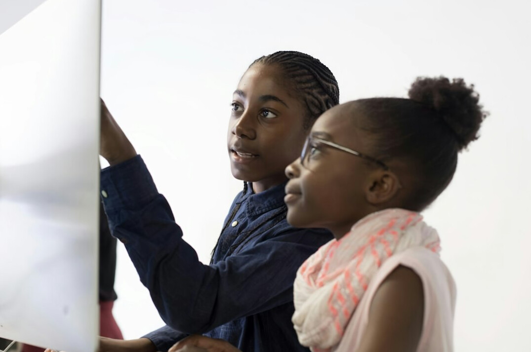 kids and adults coding together