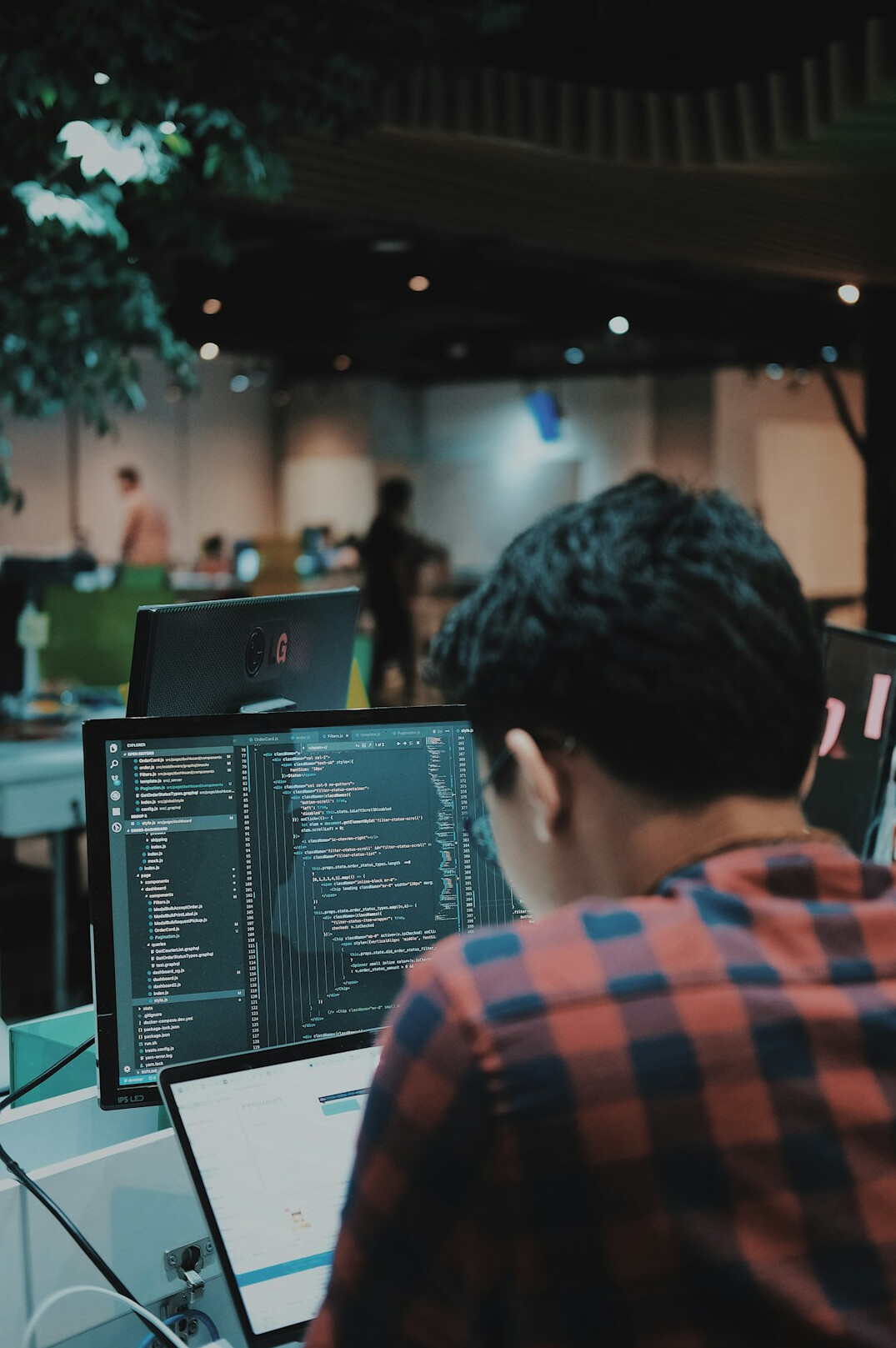 young programmer at desk