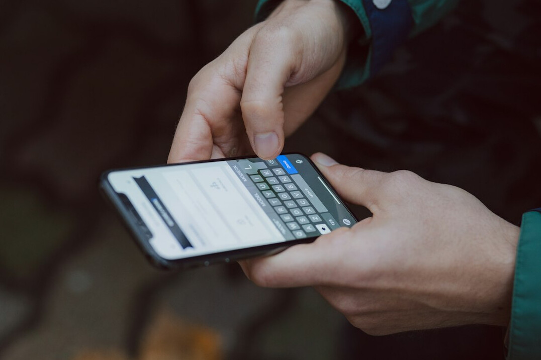 person using smartphone in daily life