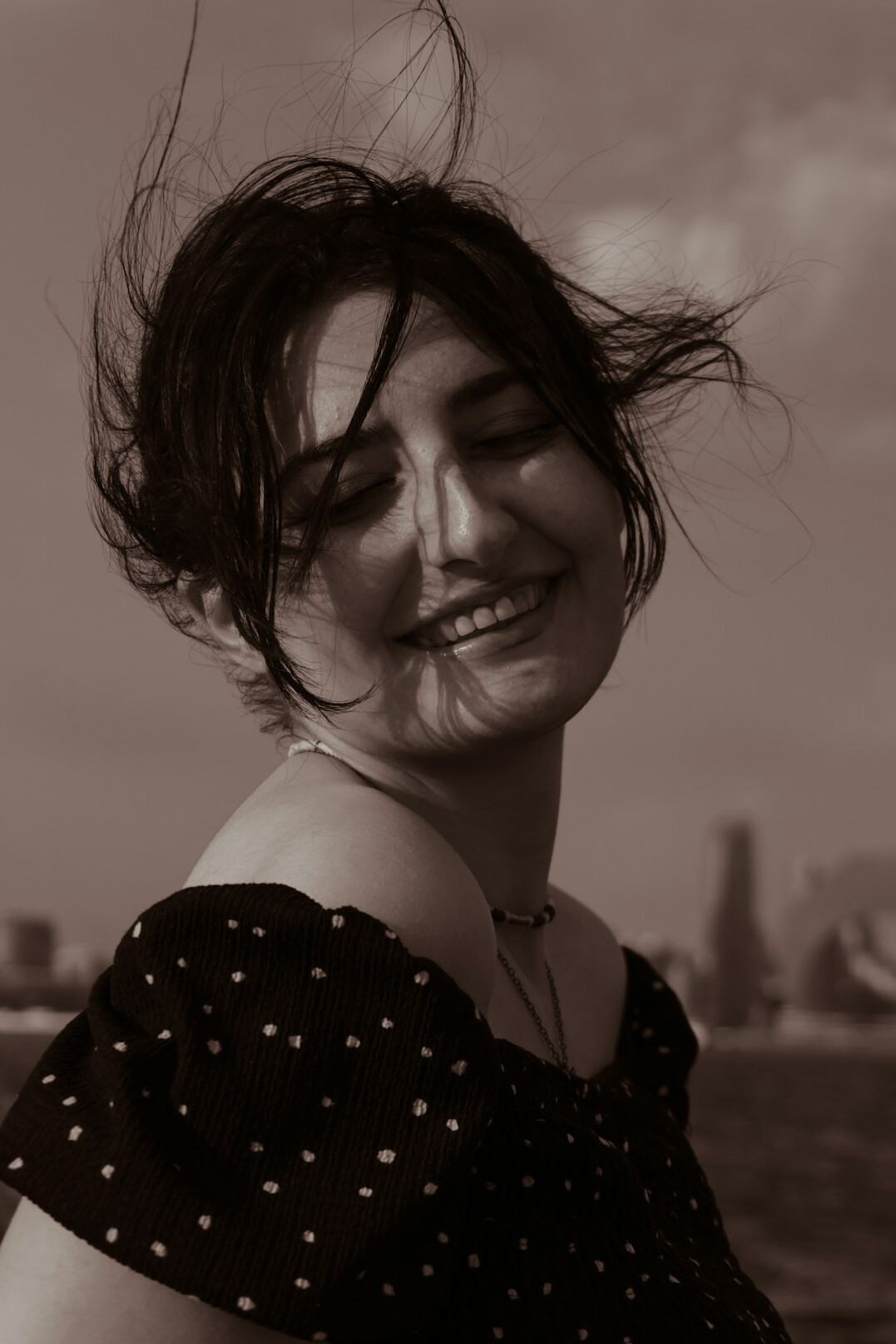Portrait of a smiling woman with shoulder-length hair