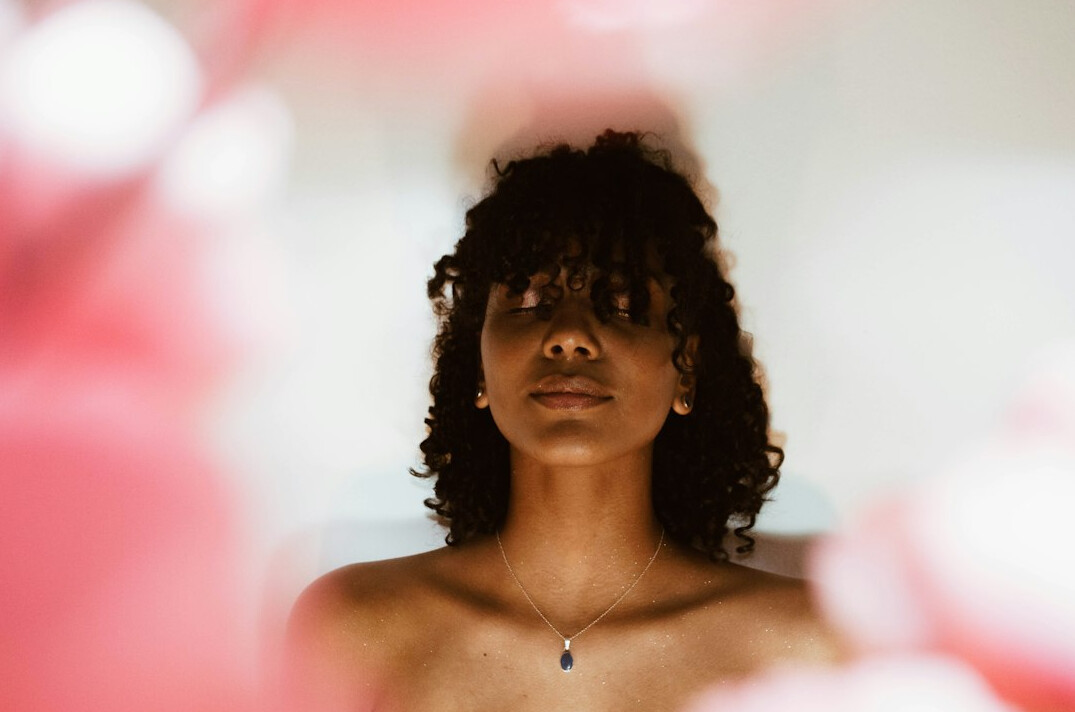 Portrait of a woman with curly dark hair
