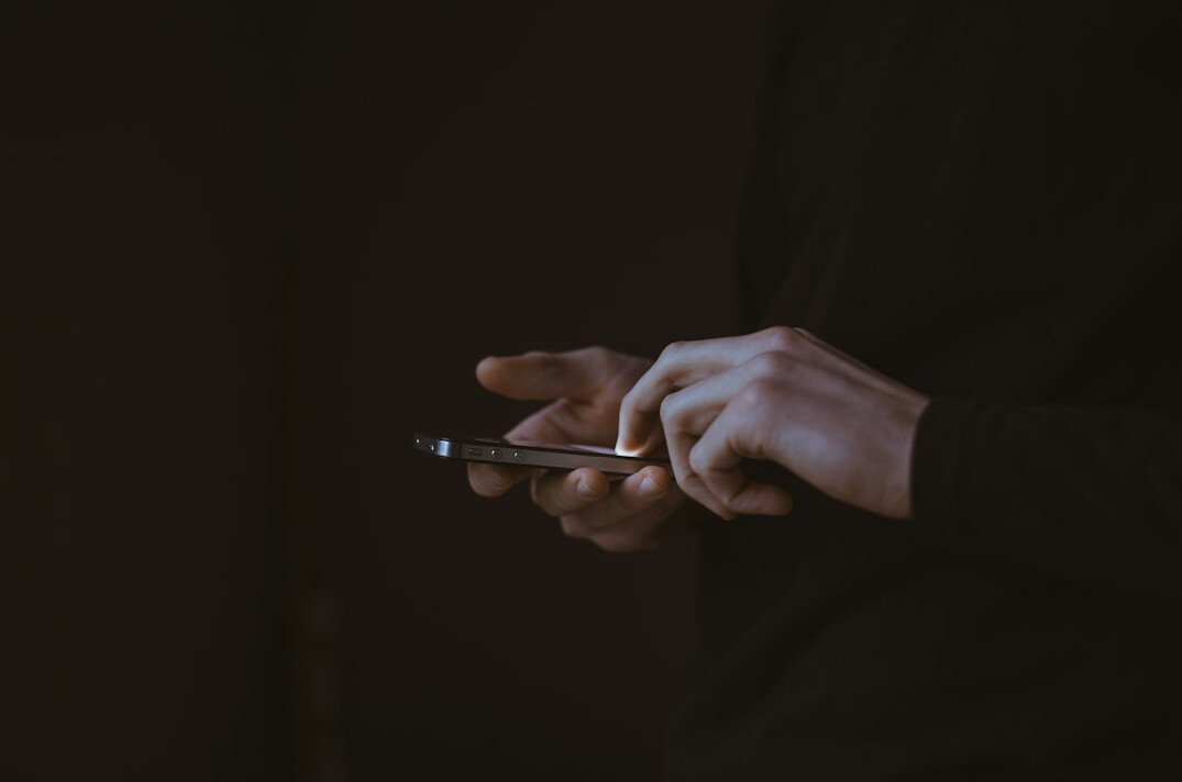 person using smartphone in daily life