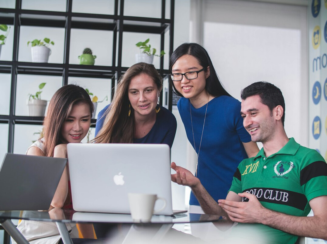group of people learning coding