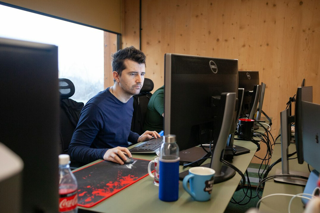 beginner programmer at desk