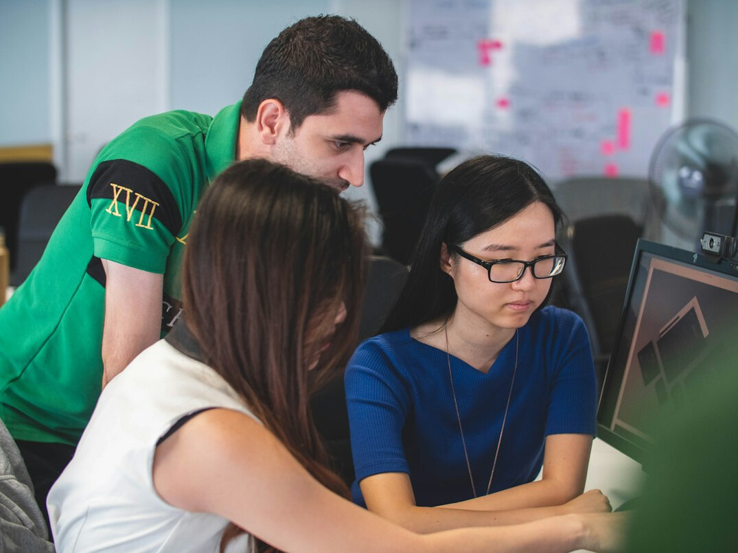 group of diverse people coding