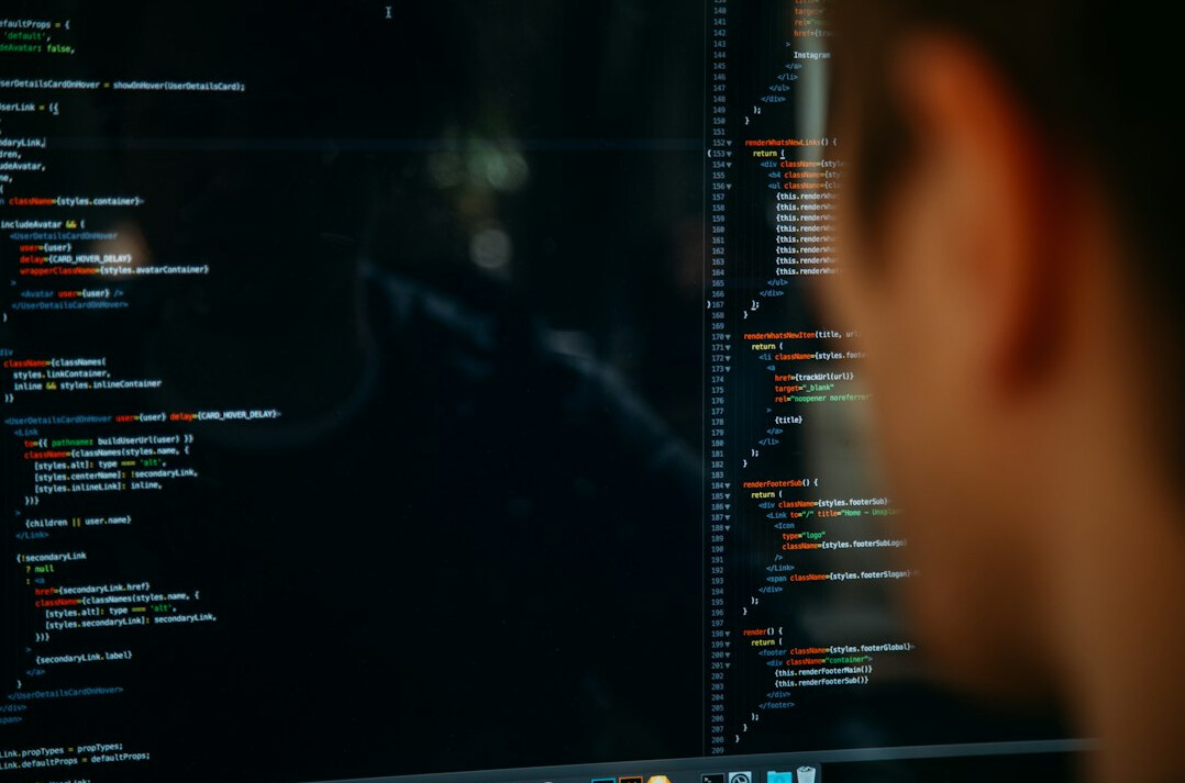 young person learning to code